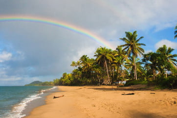 Rainbow on beach, Fiji, Pacific Islands.